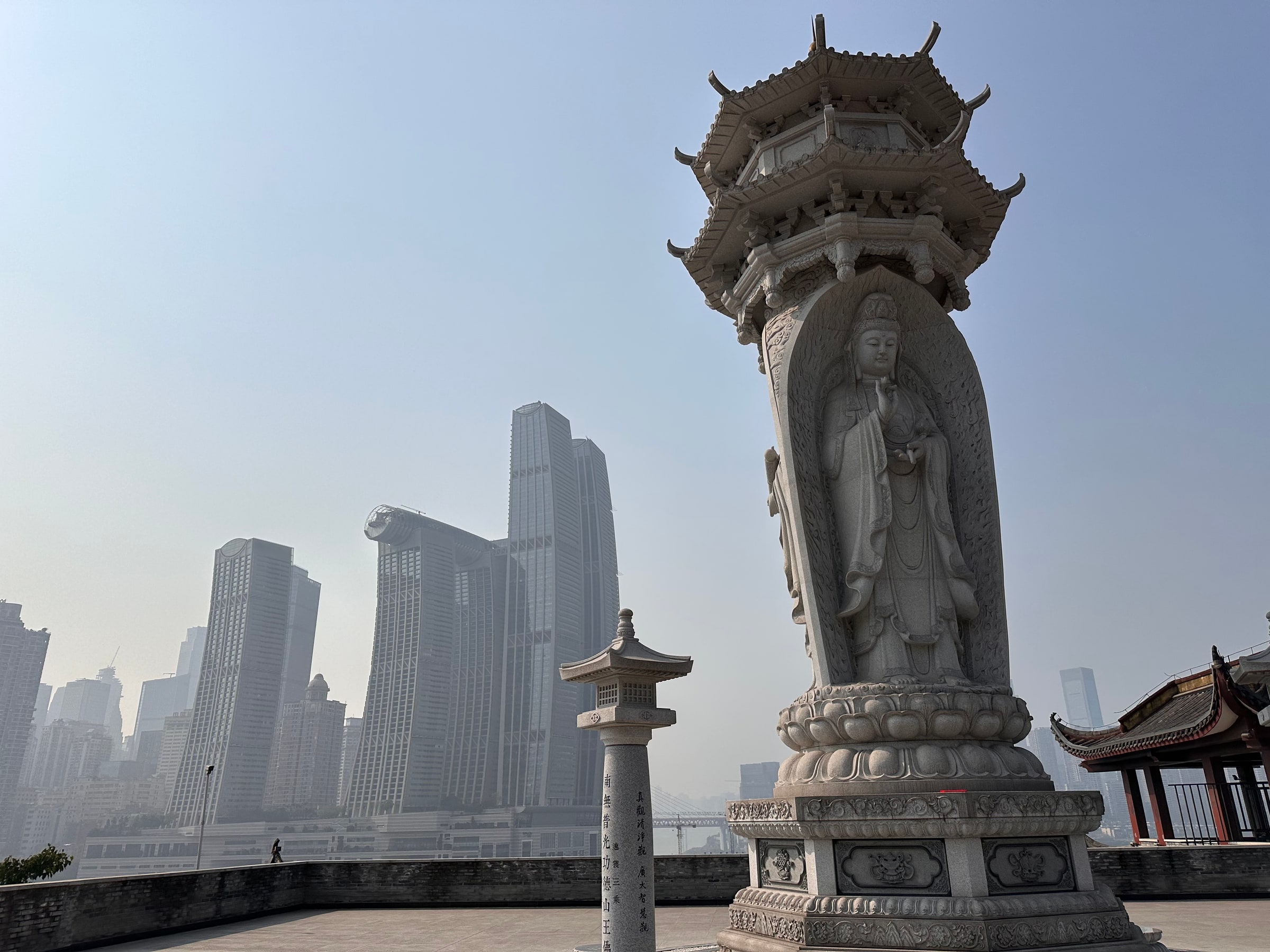 Ciyun Temple and Chongqing Raffles City seen through winter haze